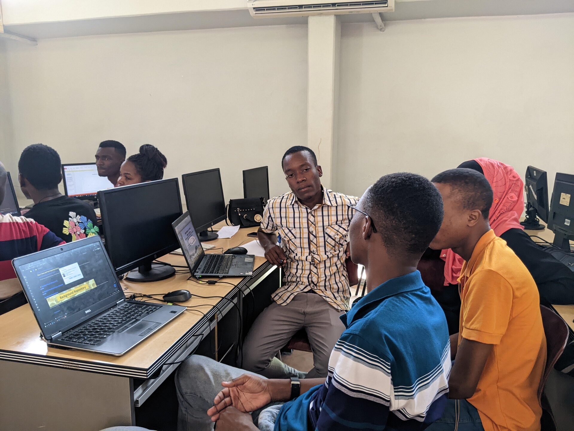 Students collaborating on a data science project in a lab session